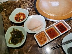 腌萝卜片-猪啊牛呀羊啊铜盘烤肉(正大广场店)