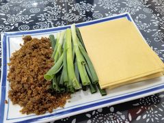 勾魂小媳妇-八两八金·莱芜特色炒鸡(市南漳浦路店)