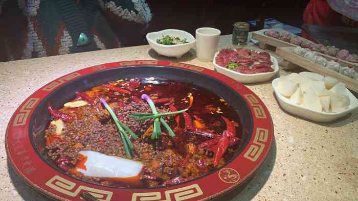 渝南三兄弟老火锅(李家沱店)-"就一天附近,网上团购的很便宜. [薄荷].