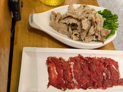 -明何记涮牛肚(品牌首店隋唐植物园南门古城路店)