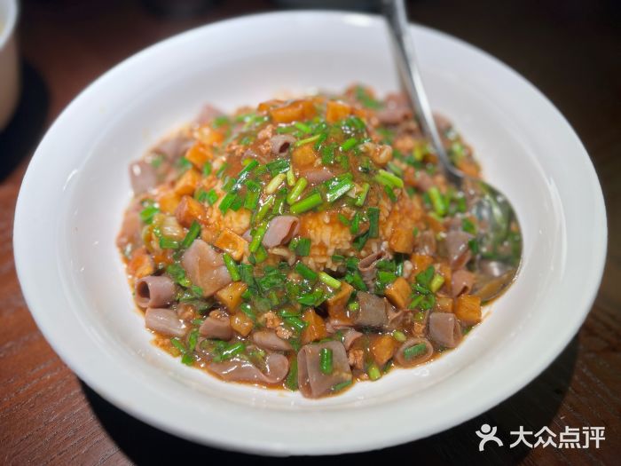 新连采·海鲜·大连菜(大连恒隆广场店)海肠捞饭图片