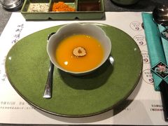 餐前南瓜粥-草家酱蟹炭火烤肉店(珲春南路一店)