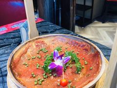 绝代双椒小嫩牛-热火朝天鲜切牛肉火锅(南强街巷店)