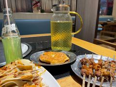 -明何记涮牛肚(品牌首店隋唐植物园南门古城路店)