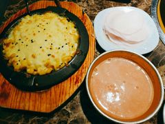 腌萝卜片-猪啊牛呀羊啊铜盘烤肉(正大广场店)