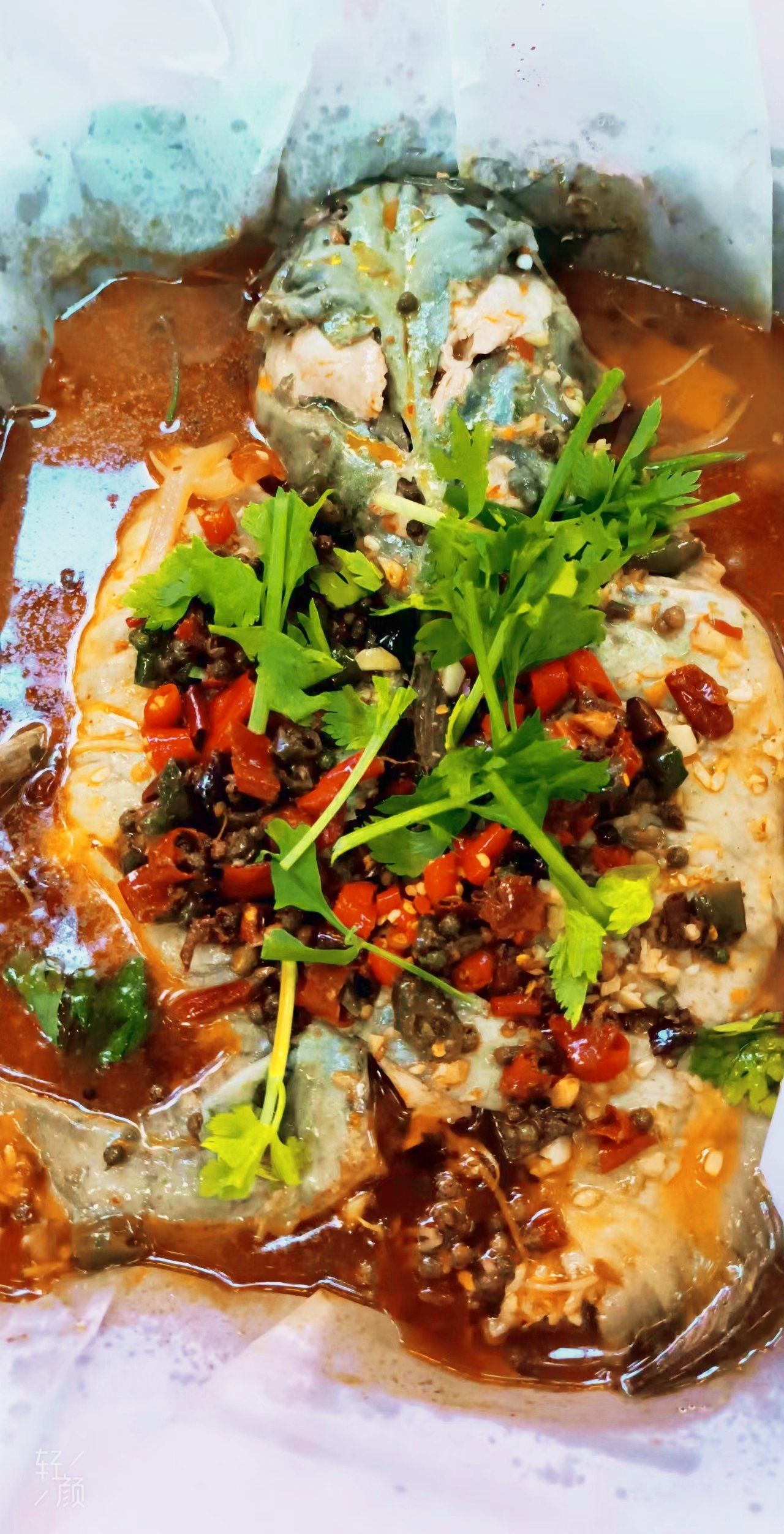 位于地铁6号线田家湾站附近的川味烧烤纸包鱼店,给