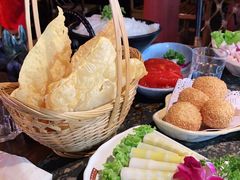 -老牌坊云南鱼豆花火锅(哈西万达店)