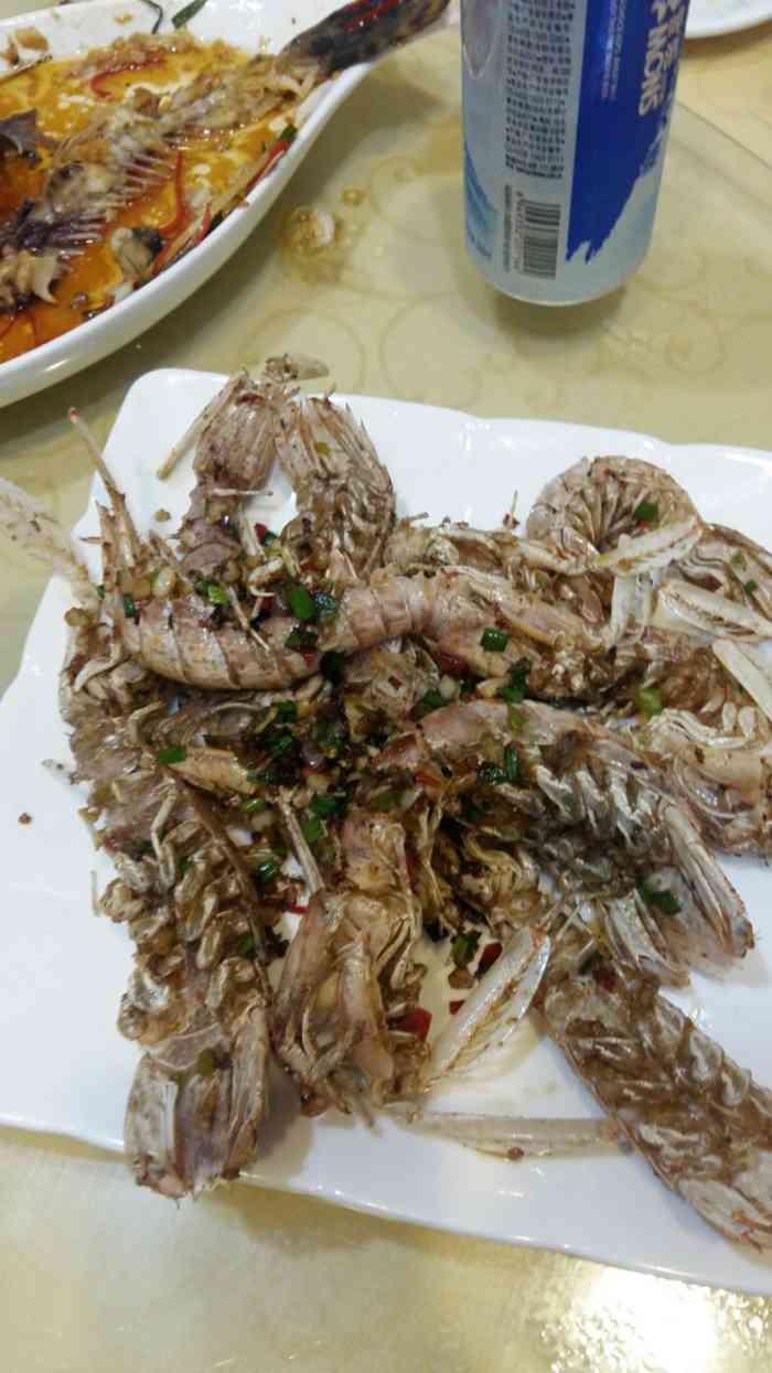 老渔翁海鲜加工店-"他们家的位置在文明街,河西路和跃进街交叉.