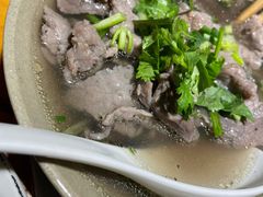 翘脚牛肉-大众跷脚牛肉馆·非遗传承单位(峨眉山店)