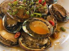 秘制小鲍鱼-1910老鲁味海鲜·戳子肉·青岛菜(金沙滩店)