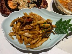 梭子蟹炒年糕-卯时·龙光雅宴·精致锡帮菜(惠山古镇店)