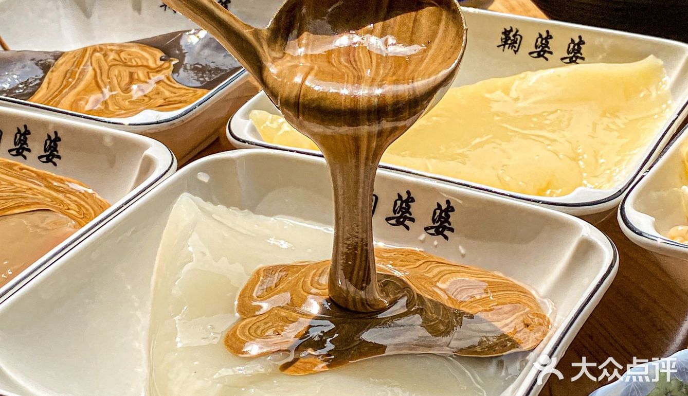 打动车来乐山必吃的一碗黑米凉糕‼️