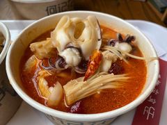香辣墨鱼仔-何记花甲(海岸城旗舰店)