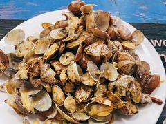 辣炒蛤蜊-1910老鲁味海鲜·戳子肉·青岛菜(金沙滩店)
