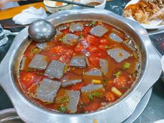 -黄利砖万峰林布依特色酸笋牛肉馆