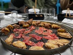 -彝人部落火盆烧烤(原内环足球场店)