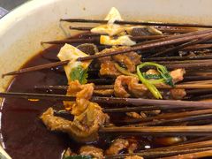 -拈签一笑黄牛肉辣卤串串