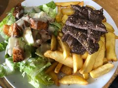 Marinated steak strips, chips and Salad -Copper Rose Cafe