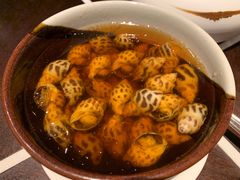 古越陈酿煮花螺-杭州西子湖四季酒店·金沙厅