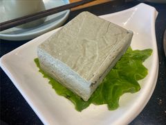 手工黑豆花-明何记涮牛肚(品牌首店隋唐植物园南门古城路店)