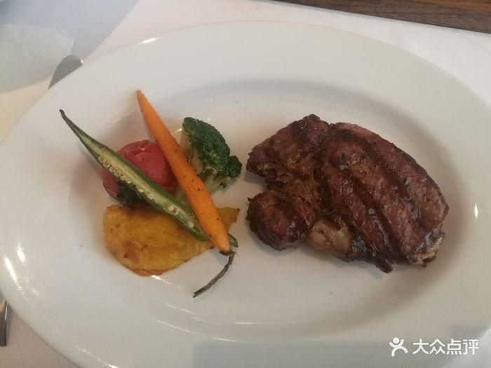 佐度王子扒房(哈西店)果木炙烤180天肉眼牛排图片