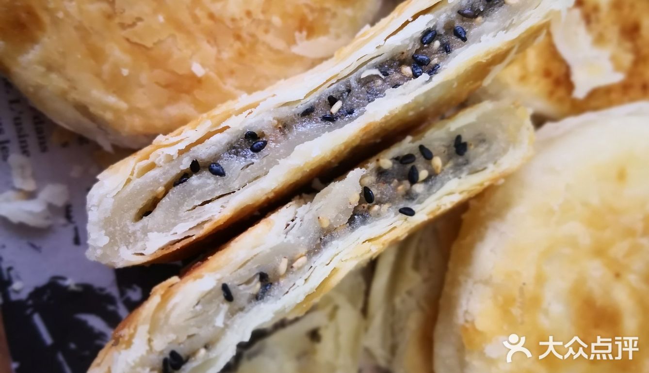 酥掉渣的白糖芝麻饼，吃的时候一定要接着点