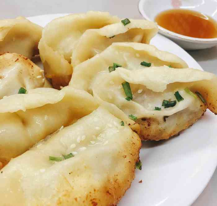 胡记锅贴-"生煎锅贴小笼包,上海小孩从小就爱的东西,.