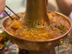 土司铜锅油焖鸡-浩海火烧云傣家菜(京广店)