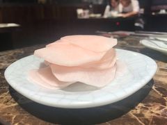 腌萝卜片-猪啊牛呀羊啊铜盘烤肉(正大广场店)