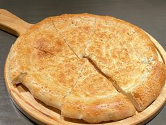 新疆烤馕-西域盛宴烧烤新疆菜清真餐厅(古美店)