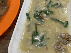 葱姜炒花螺-贞姨美食·老字号海鲜大排档