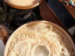 -老牌坊云南鱼豆花火锅(哈西万达店)