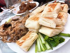 -渔民船说·北塘海鲜·天津菜·海肠捞饭(北塘古镇店)