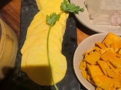 地瓜片-老牌坊云南鱼豆花火锅(哈西万达店)