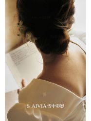 -雪中彩影婚纱摄影·微光艺术中心