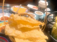 -老牌坊云南鱼豆花火锅(哈西万达店)