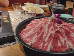 -老牌坊云南鱼豆花火锅(哈西万达店)
