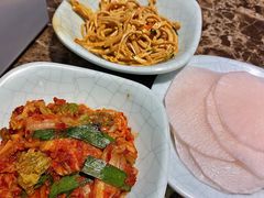 腌萝卜片-猪啊牛呀羊啊铜盘烤肉(正大广场店)