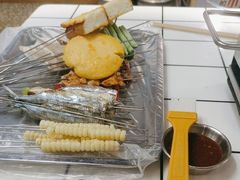 -喜悦小串丹东小黄牛海鲜烧烤大排档(民主广场店)