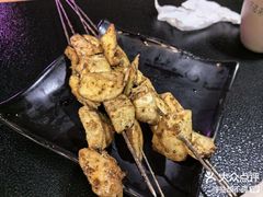-明何记涮牛肚(品牌首店隋唐植物园南门古城路店)