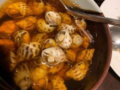 古越陈酿煮花螺-杭州西子湖四季酒店·金沙厅