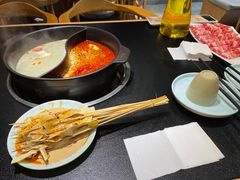 -明何记涮牛肚(品牌首店隋唐植物园南门古城路店)