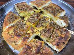 隔壁店的蒜蓉烤馕-清真·马峰烤肉(小学习北巷店)