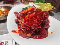 草家招牌酱辣蟹-草家酱蟹炭火烤肉店(珲春南路一店)