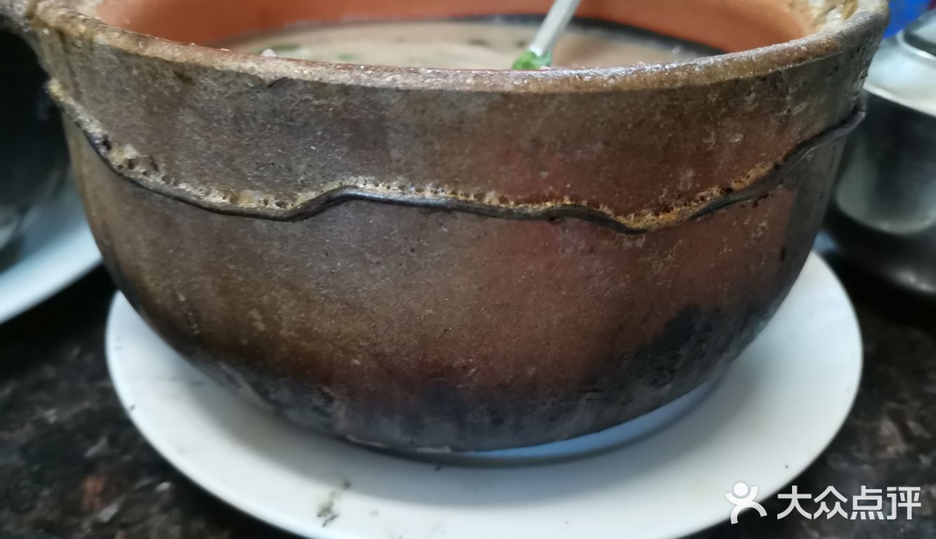 店里还有特制酱料蘸粥里的海鲜