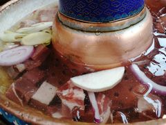 -毛辣果·贵州红酸汤牛肉火锅(西单店)
