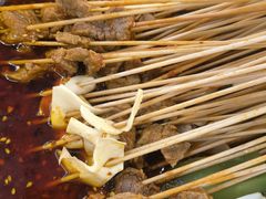 -拈签一笑黄牛肉辣卤串串