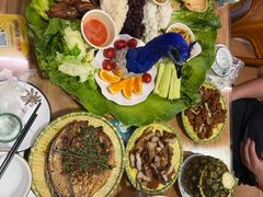 -沐毫傣泐云南菜孔雀宴•手抓饭傣味烧烤(曼听公园店)