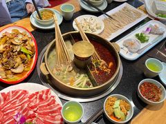 -明何记涮牛肚(品牌首店隋唐植物园南门古城路店)