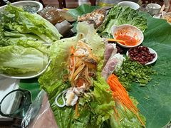 -沐毫傣泐云南菜孔雀宴•手抓饭傣味烧烤(曼听公园店)